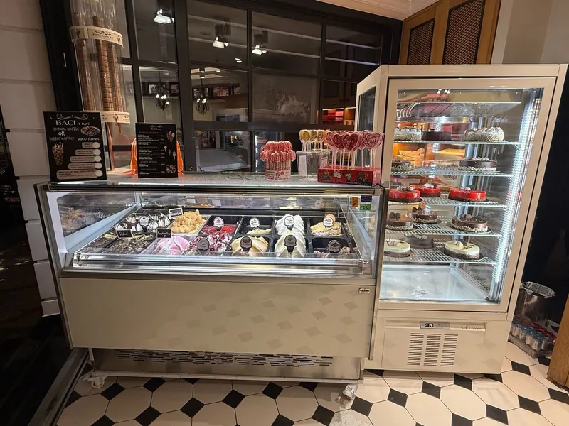 The gelato counter and cake fridge inside Baci A Tutti