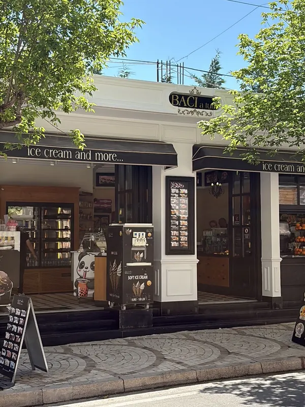 Baci A Tutti storefront on Rruga Mitat Hoxha with the ‘ice cream and more’ awning